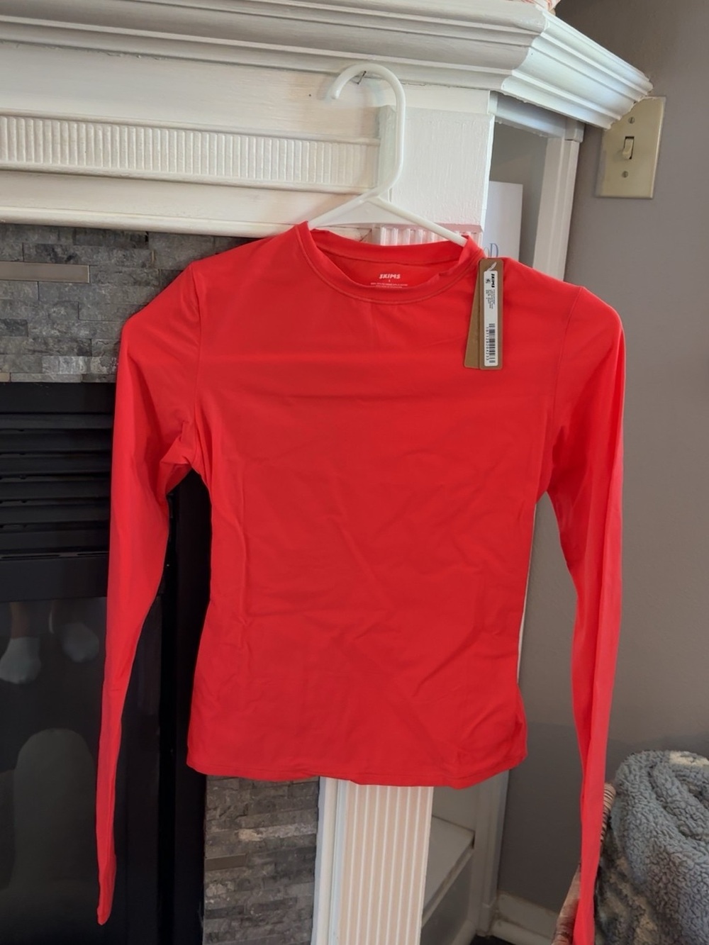 SKIMS fits every body Long-Sleeve Crew Top in Poppy